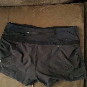 Lululemon short black shorts with black ribbon tie.
